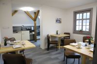 Breakfast room with a view into the kitchen